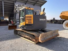 2015 Volvo ECR145DL crawler excavator, rear three-quarter view 2015 Volvo ECR145DL crawler excavator, rear three-quarter view