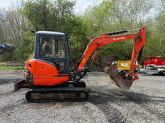 2014 Kubota KX101-3 mini excavator, side profile view