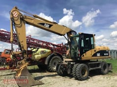 2003 Caterpillar M315C wheel excavator, side view 2003 Caterpillar M315C wheel excavator, side view