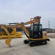2022 Caterpillar 305.5E2 mini excavator, side profile view