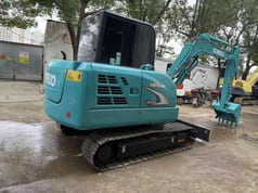 2018 Kobelco SK60-8 mini excavator, rear three-quarter view 2018 Kobelco SK60-8 mini excavator, rear three-quarter view