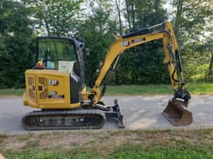 2022 Caterpillar 304 mini excavator, side view