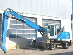 2013 Fuchs MHL335 E material handler, side view