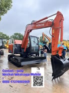 Hitachi ZAXIS 70 mini excavator, front three-quarter view Hitachi ZAXIS 70 mini excavator, front three-quarter view