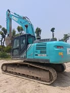 2024 Kobelco SK260 excavator, rear three-quarter view 2024 Kobelco SK260 excavator, rear three-quarter view