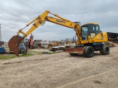 2007 Komatsu PW140-7 wheel excavator, side profile view 2007 Komatsu PW140-7 wheel excavator, side profile view