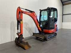 Kubota KX019-4 mini excavator, side view Kubota KX019-4 mini excavator, side view