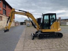 Caterpillar 306CR-07A mini excavator, side view
