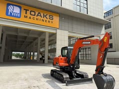2024 Doosan DX75-9C mini excavator, side profile view