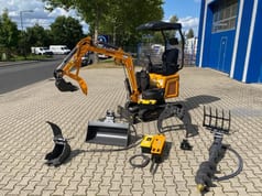 Berger Kraus BK1300JSR mini excavator with attachments, side view Berger Kraus BK1300JSR mini excavator with attachments, side view