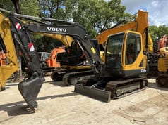 2023 Volvo EC55B mini excavator, front three-quarter view