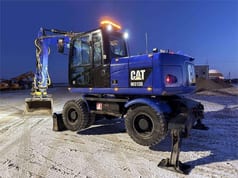 2014 Caterpillar M313D wheel excavator, rear three-quarter view