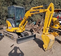 Komatsu PC30MR mini excavator, side view