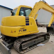 2023 Komatsu PC60 crawler excavator, rear three-quarter view