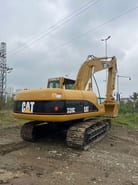2021 Caterpillar 320C crawler excavator rear three-quarter view