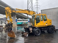 2001 Atlas 1404KZW wheel excavator, side view 2001 Atlas 1404KZW wheel excavator, side view