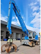 2011 Fuchs MHL350E material handler, side view