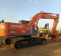 Hitachi Zaxis 210 crawler excavator, rear three-quarter view