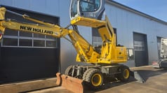 2011 New Holland WE150C wheel excavator, side view