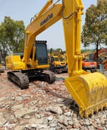 2019 Komatsu PC160 crawler excavator, front three-quarter view