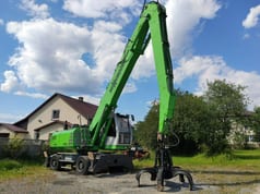 2012 Sennebogen 825 material handler, side view 2012 Sennebogen 825 material handler, side view