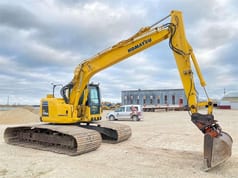 2012 Komatsu PC138US-8 crawler excavator side view 2012 Komatsu PC138US-8 crawler excavator side view
