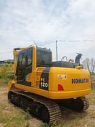 2023 Komatsu PC120 crawler excavator, rear three-quarter view