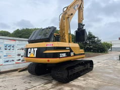 2023 Caterpillar 320BL crawler excavator, rear three-quarter view 2023 Caterpillar 320BL crawler excavator, rear three-quarter view