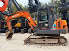 2024 Doosan DH55 crawler excavator, side view