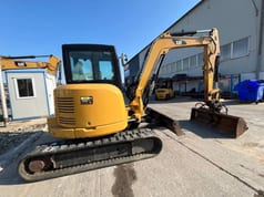 2019 Caterpillar 305.5E2 crawler excavator, rear three-quarter view