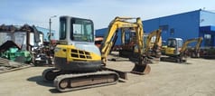 2006 New Holland E50.2C mini excavator, rear three-quarter view