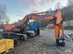 1998 Hitachi EX165 crawler excavator, side view