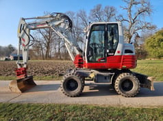 2020 Takeuchi TB295W wheel excavator side view