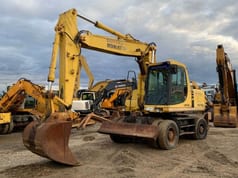 1998 Komatsu PW170ES wheel excavator, front three-quarter view 1998 Komatsu PW170ES wheel excavator, front three-quarter view