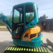 2023 Kubota U25 mini excavator, side profile view