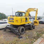2023 Komatsu PW160W-7 wheel excavator, rear three-quarter view 2023 Komatsu PW160W-7 wheel excavator, rear three-quarter view