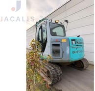 2003 Kobelco SK80MSR-1E mini excavator, rear three-quarter view 2003 Kobelco SK80MSR-1E mini excavator, rear three-quarter view