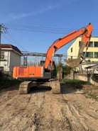 2022 Hitachi Zaxis 210 excavator, side view