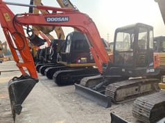 2024 Doosan DH55 mini excavator, front three-quarter view 2024 Doosan DH55 mini excavator, front three-quarter view