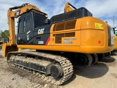 2022 Caterpillar 330D2 excavator, rear three-quarter view