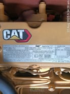 2025 Caterpillar 323D3 engine emission control plate