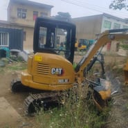 2021 Caterpillar 303.5E mini excavator, rear three-quarter view 2021 Caterpillar 303.5E mini excavator, rear three-quarter view