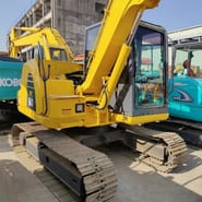 2022 Komatsu PC60-8 mini excavator, rear three-quarter view 2022 Komatsu PC60-8 mini excavator, rear three-quarter view