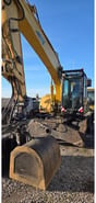2006 Caterpillar M318CMH wheel excavator front view 2006 Caterpillar M318CMH wheel excavator front view