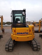 2024 Komatsu PC55MR-5 mini excavator, rear view