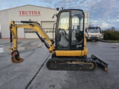2015 Caterpillar 302.7D CR mini excavator side view 2015 Caterpillar 302.7D CR mini excavator side view