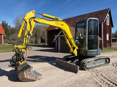 2007 New Holland E352 C excavator, side profile view 2007 New Holland E352 C excavator, side profile view