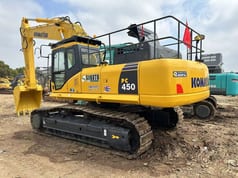 2023 Komatsu PC450-7 crawler excavator, rear three-quarter view 2023 Komatsu PC450-7 crawler excavator, rear three-quarter view