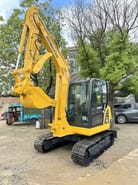 2022 Komatsu PC56-7 mini excavator, front three-quarter view 2022 Komatsu PC56-7 mini excavator, front three-quarter view