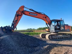 2021 Doosan DX225LC-5 crawler excavator side view 2021 Doosan DX225LC-5 crawler excavator side view
